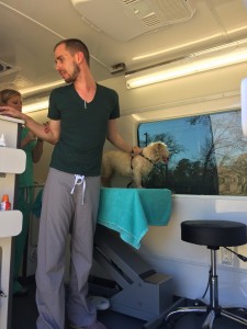 Dr. Eich, Bobby, and George in the mobile vet van in my driveway.